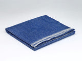 Luxurious blue Oxford scarf woven by McNutt of Donegal, combining soft cashmere and merino lambswool for all-season comfort.